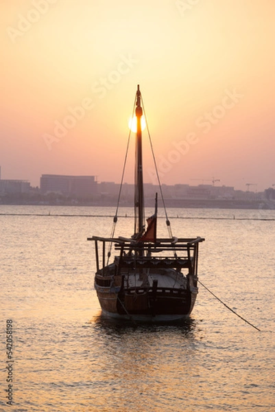 Fototapeta boat in the sunset