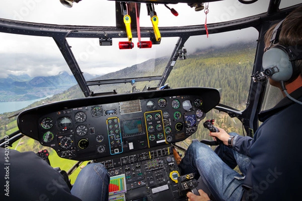 Obraz Hubschrauberflug in Cockpitansicht