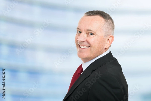 Fototapeta Smiling businessman portrait