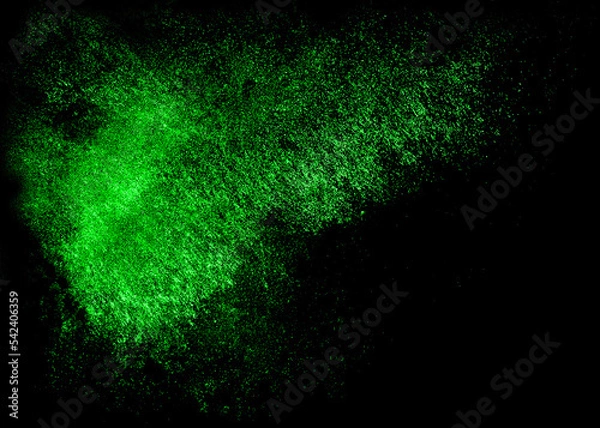 Fototapeta Greens sequins glisten with dust isolated on a black background. Horizontal abstract background with sparkling dust, space for text	
