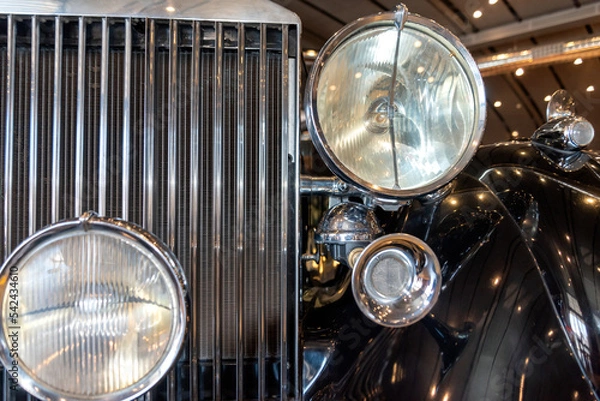 Fototapeta radiator grille and headlight of retro car