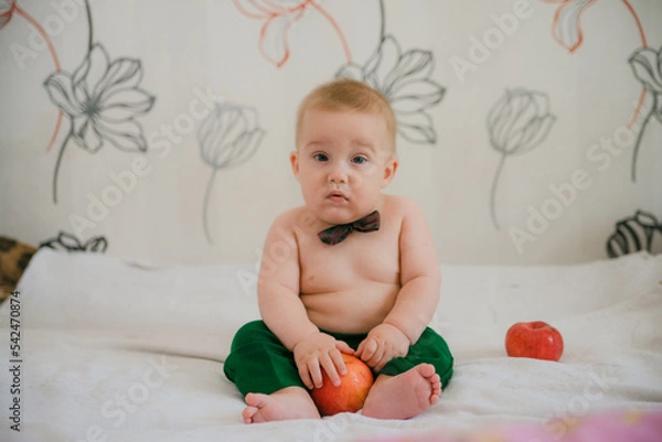 Fototapeta baby child playing with toy