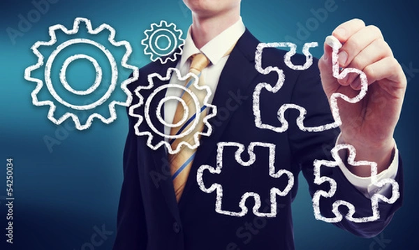 Fototapeta Business Man with Gears and Puzzle Pieces