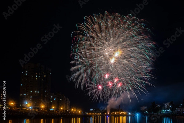 Obraz fireworks over the river in the city