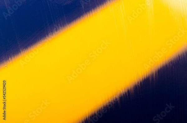 Obraz Blue and yellow colors paper texture background. Motion blur texture background. Place for text. Abstract rain lines. Blue and yellow abstract pattern.