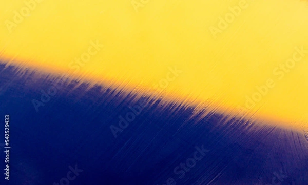 Obraz Blue and yellow colors paper texture background. Motion blur texture background. Place for text. Abstract rain lines. Blue and yellow abstract pattern.