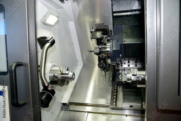 Obraz 最新の工作機械を導入した部品工場