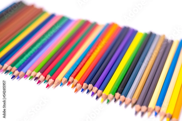 Obraz Colored pencils multi-colored tilted on a white background