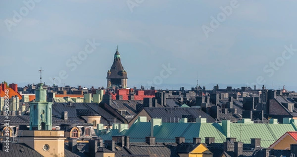 Fototapeta Panorama, tin roofs, dorms and tower in the district Vasastan a sunny autumn day in Stockholm