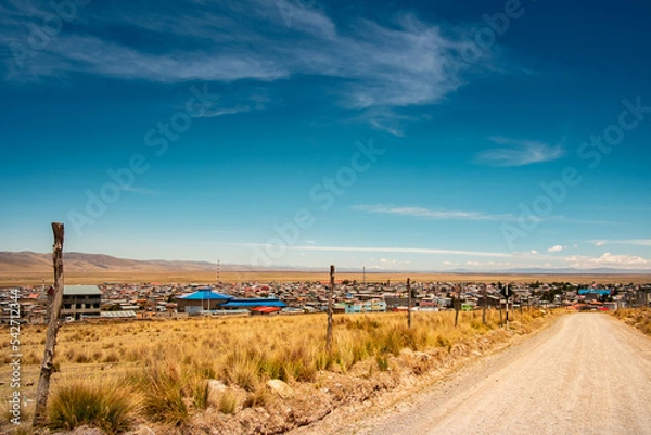 Fototapeta view of the eastern part of the city of Junin, in the peruvian Andes, from a gauge road