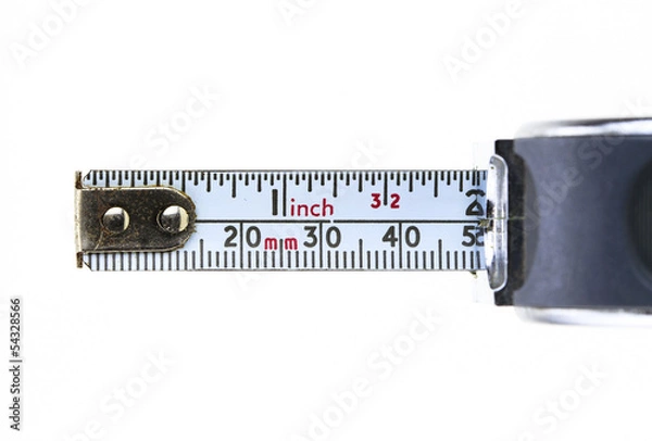 Fototapeta closeup of a metal tape measure in a white background