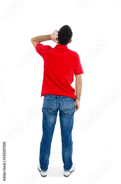 Obraz Back view of young man standing with hand on head. Isolated on white background. Studio shot. Full length.