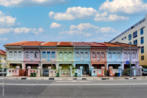 Obraz Colourful heritage facade of prewar houses with beautiful sky