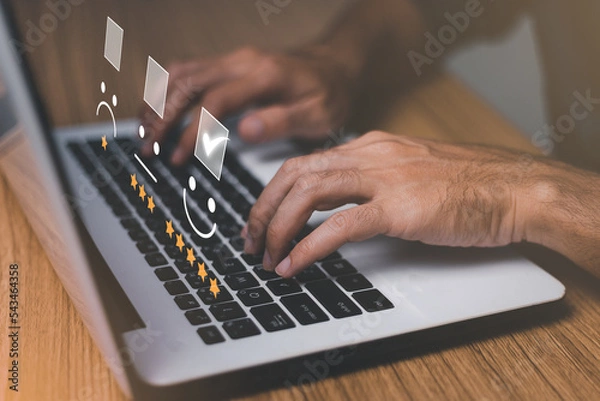 Fototapeta Customer service satisfaction survey concept.Business people or customers show satisfaction through the application on the tablet screen. By giving the most satisfaction rating and 5 stars.