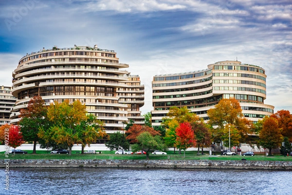 Obraz The Watergate Hotel complex from the Potomac River in Washington, DC in autumn