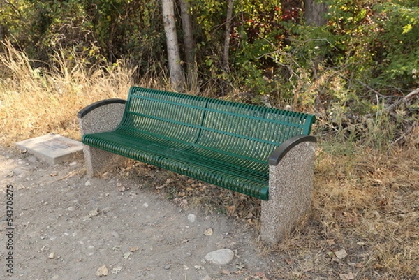 Fototapeta Bench along trail