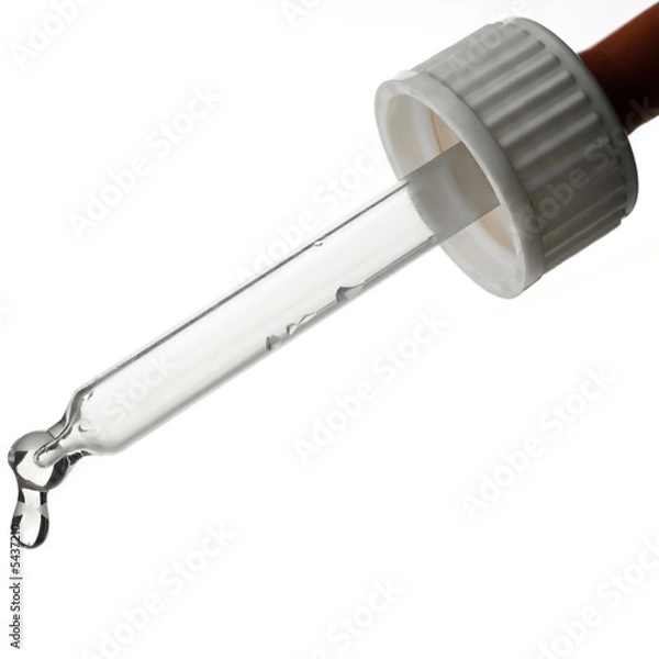 Obraz a drop oozing from a dropper on white