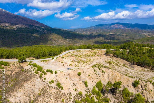 Fototapeta Spectacular aerial view to top of Attavyros mountain. Highest mountain  in Rhodes island, Greece.