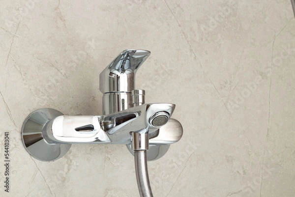 Obraz Close-up of a new water faucet located on the wall