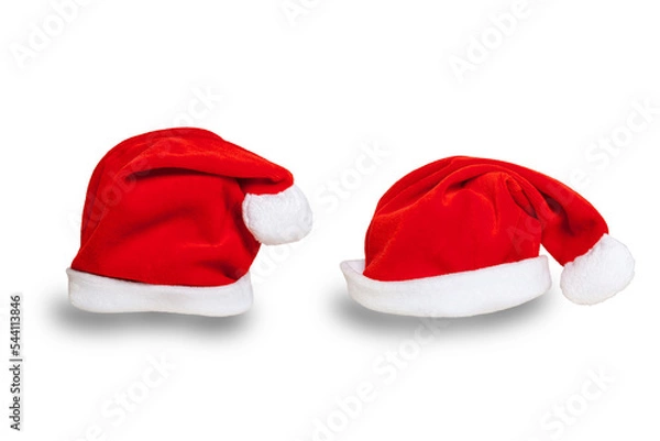 Obraz Set of two Santa red hats isolated on white background. Copy space. Suitable for collage and banner making and any other Christmas and New Year design