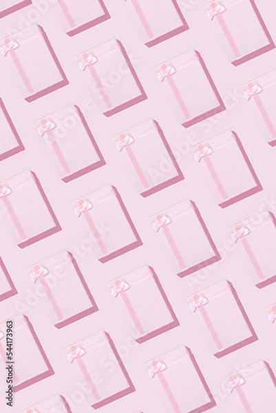 Obraz Monochrome Christmas present idea, minimal vertical pattern composition. New year and winter season concept with pink gifts.