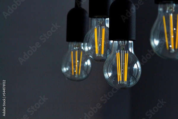 Obraz Set of vintage light bulbs on black background