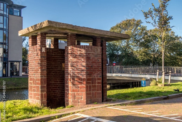Fototapeta Den Helder, Netherlands. October 2022. A public toilet in the style of the Amsterdam School.