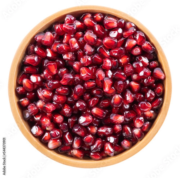 Fototapeta Pomegranate seeds in wooden bowl top view isolated on transparent background with PNG.