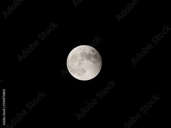 Obraz Slightly shadowed full moon very after eclipse