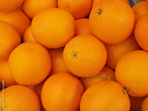 Fototapeta Oranges in a market, close-up