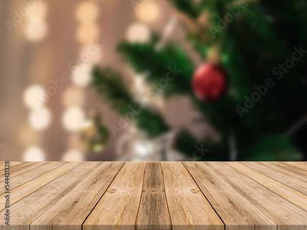 Obraz Empty wooden tabletop and blur room with a Christmas tree background, suitable for montage product
