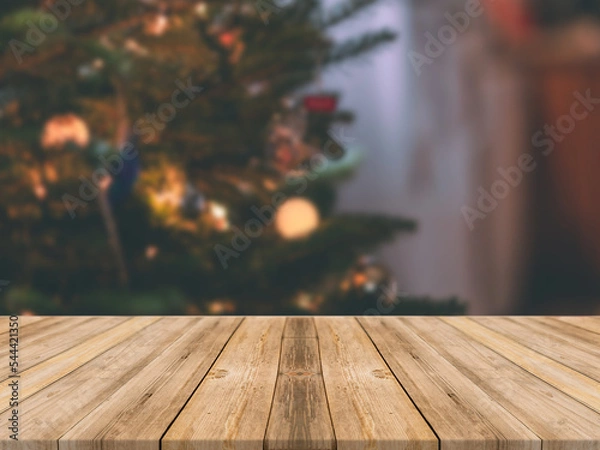 Obraz Empty wooden tabletop and blur room with a Christmas tree background, suitable for montage product