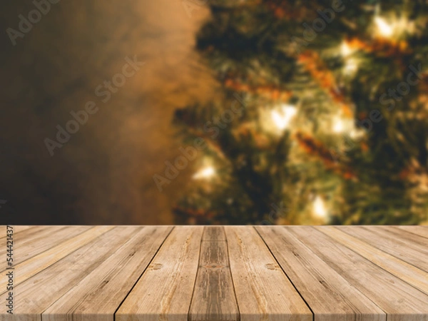 Obraz Empty wooden tabletop and blur room with a Christmas tree background, suitable for montage product