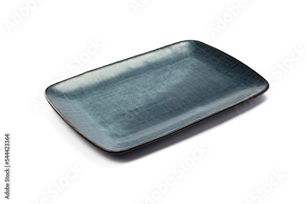 Fototapeta ceramic dark blue flat square plate with black blotches (dots, paint splashes, spots) close-up on white background