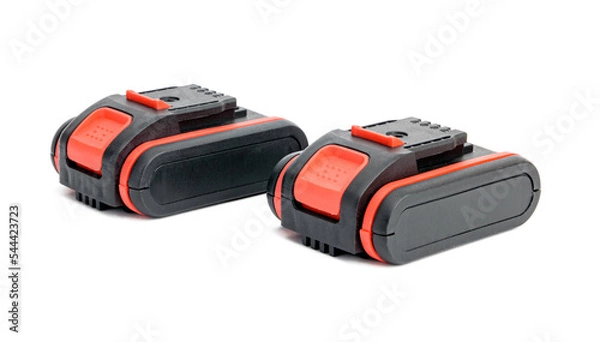 Fototapeta Lithium Batteries for Black Screwdriver Cordless Drill with Red Decorative Design Inserts Close-Up on White Background