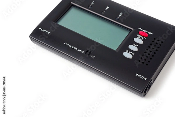 Fototapeta Tuner for tuning a bass guitar, compact, on a white background.