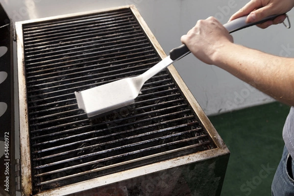 Obraz Cleaning the Grill