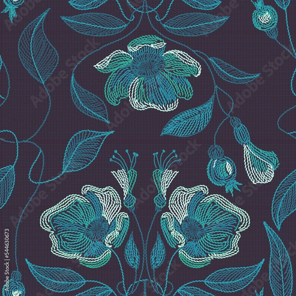 Obraz Embroidered flowers and leaves ornament on a dark background.