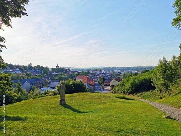 Fototapeta View from the castle to the town of Malenovice, Zlin Region, with a statue of the local Count Jaroslav Sternberg