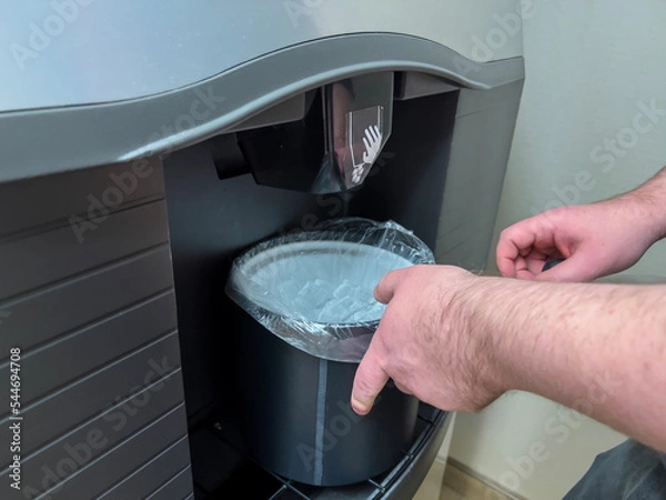 Fototapeta Selective focus, close up view of an ice machine inside a hotel