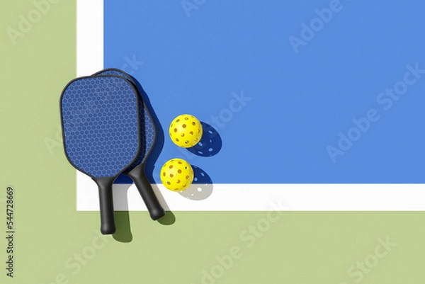 Obraz Pickleball paddles and balls on court, illuminated sunshine. Top view, place for text. 3d illustration, render.