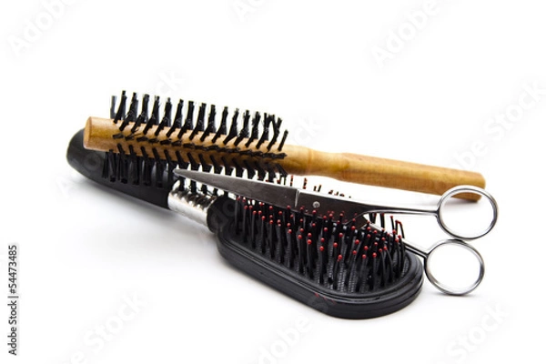Obraz Verschiedene Haarbürsten mit Haarschere