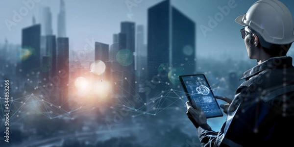Fototapeta Smart industry 4.0 technology concept, engineer using data and control networking for sustainable energy, sustainable development, energy saving, increase productivity and  efficiency management