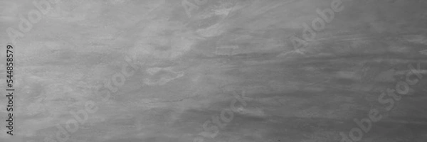 Fototapeta Cement wall plaster, spread on concrete polished textured black background abstract dark grey color material smooth surface, backdrop, decoration banner