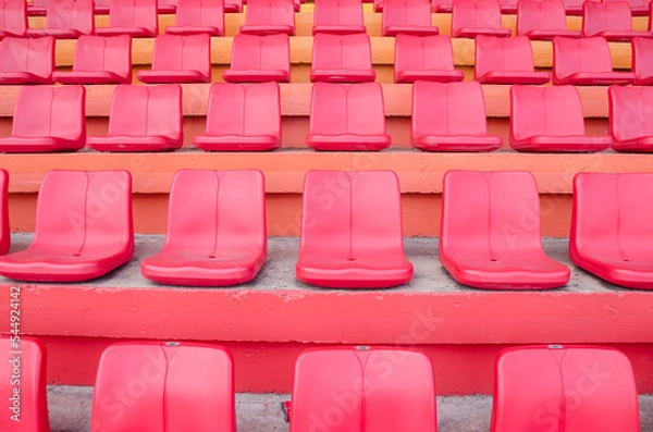 Obraz The red sport seat grandstand in an empty stadium.
