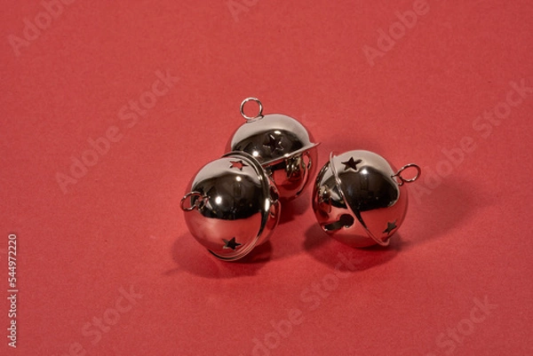 Obraz Christmas bells isolated on red background
