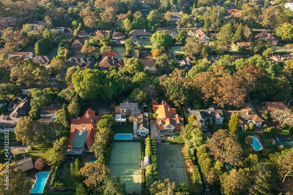 Obraz Aerial view of upmarket houses with private gardens, pools and tennis courts on Sydney's leafy North Shore.