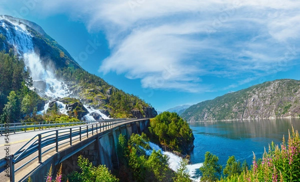 Fototapeta Summer mountain Langfossen waterfall on slope (Etne, Norway).