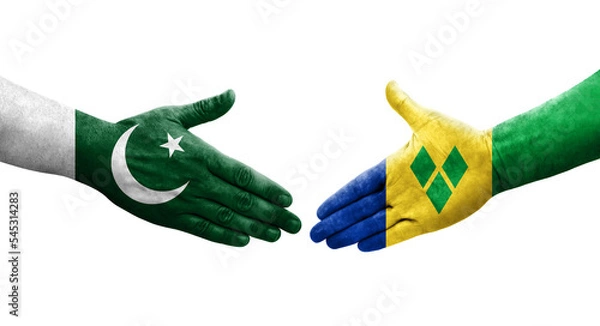 Fototapeta Handshake between Saint Vincent Grenadines and Pakistan flags painted on hands, isolated transparent image.