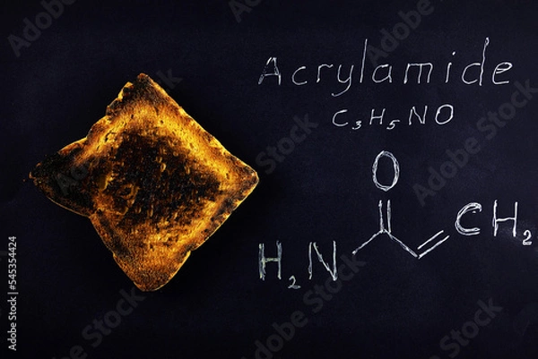 Obraz inscription chemical formula of acrylamide and black burnt bread toast containing acrylamide on a black background